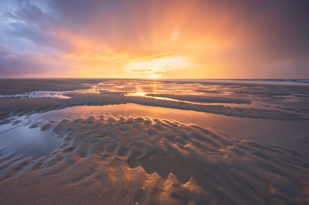 Zonsondergang op het strand